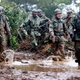 Japanese forces search for the man missing in a mudslide in Mimata on September 19.